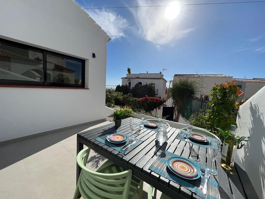 Exclusive apartment in Capistrano Village completely renovated with terrace and garden.