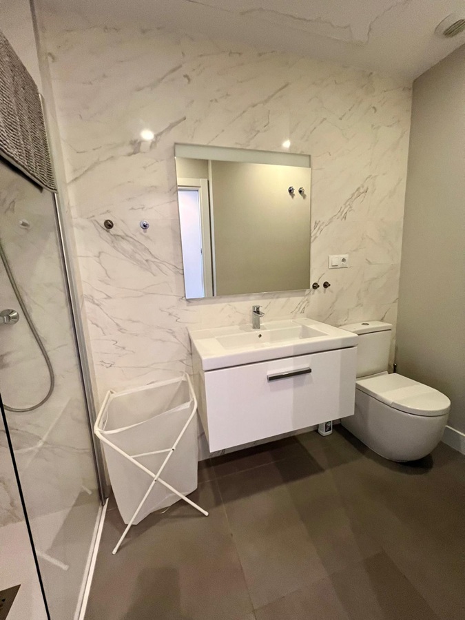 Modern appartement met gemeenschappelijk zwembad op steenworp afstand van de zee