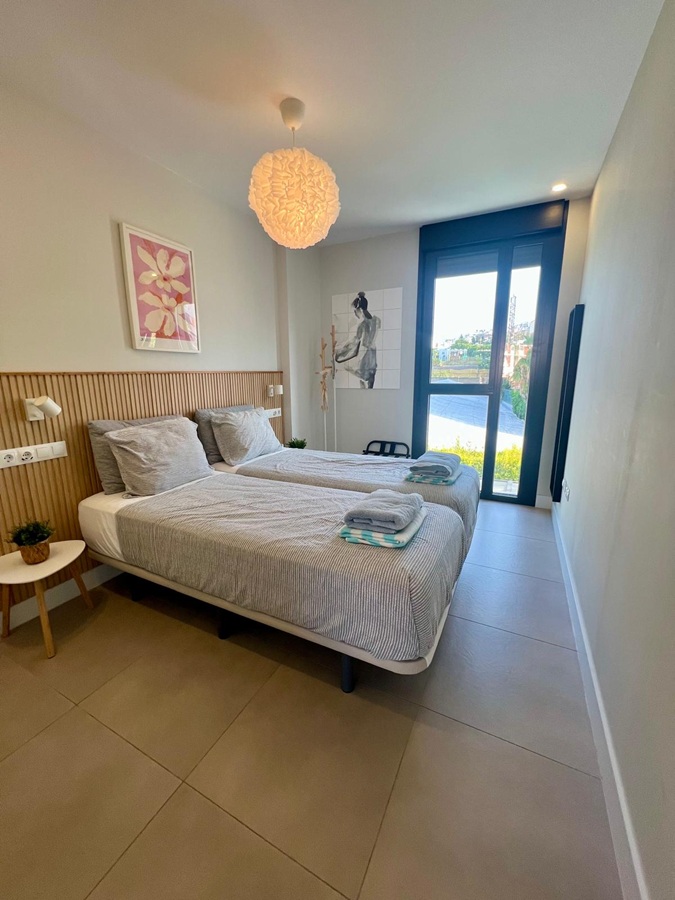 Modern appartement met gemeenschappelijk zwembad op steenworp afstand van de zee