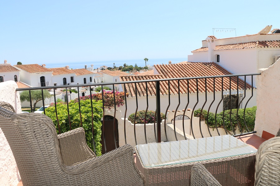Gerenoveerde vakantiewoning in het gewilde Capistrano Village in Nerja met prachtig uitzicht over Capistrano village en de zee.