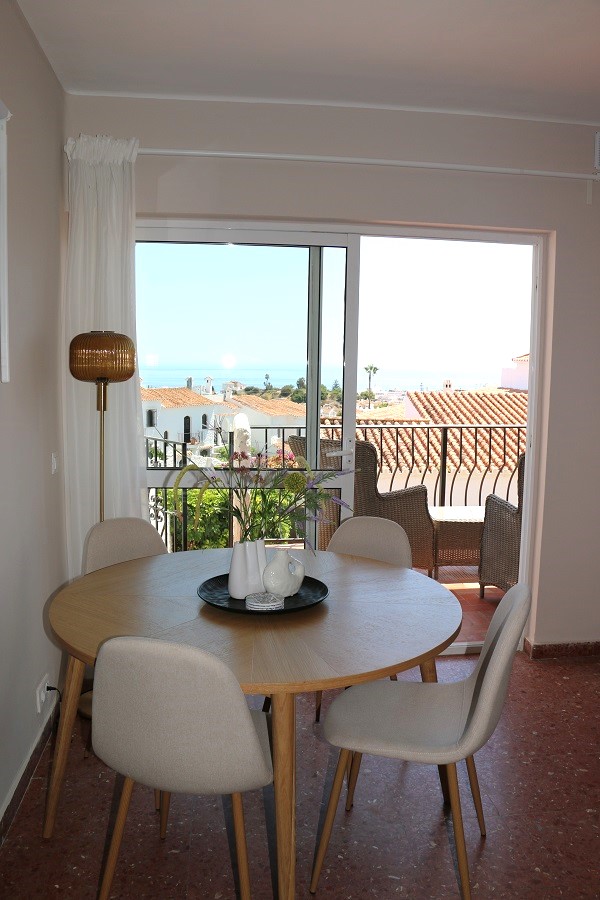 Gerenoveerde vakantiewoning in het gewilde Capistrano Village in Nerja met prachtig uitzicht over Capistrano village en de zee.
